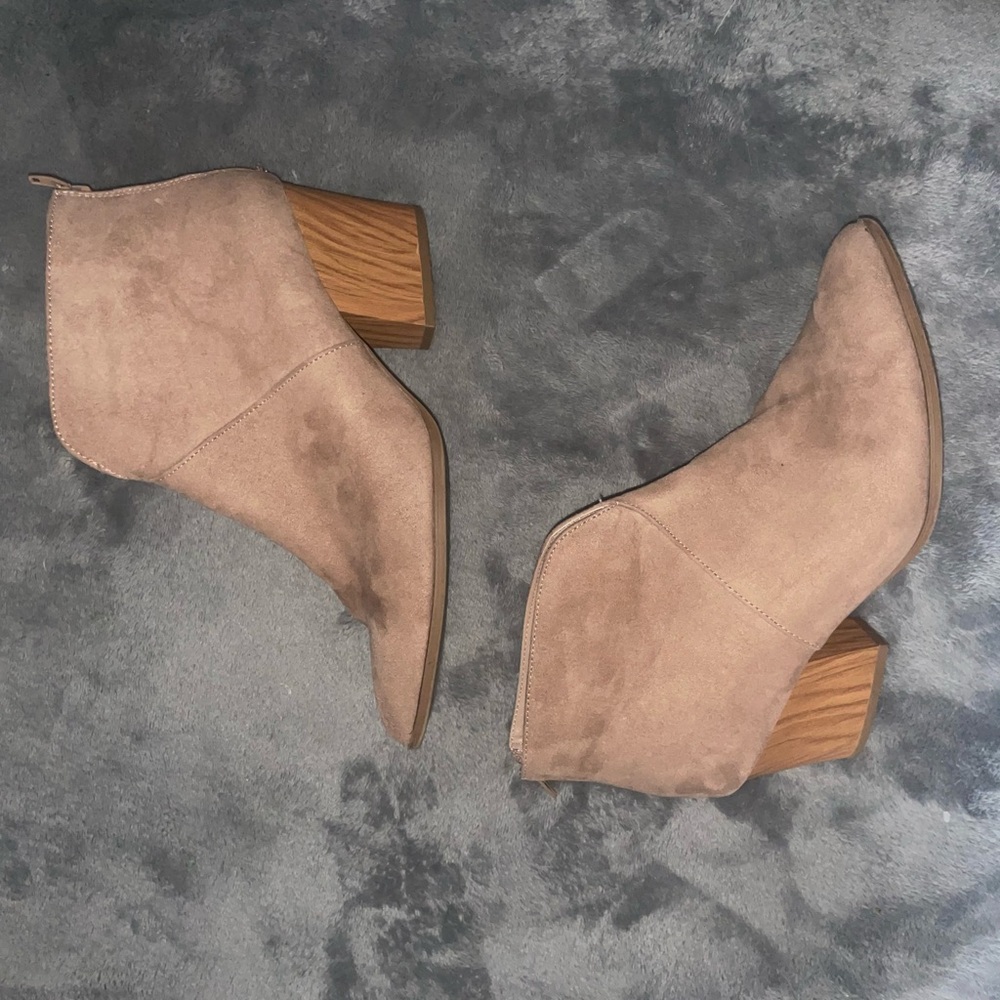 Tan suede booties with brown wooden heel. Zipper in back.
